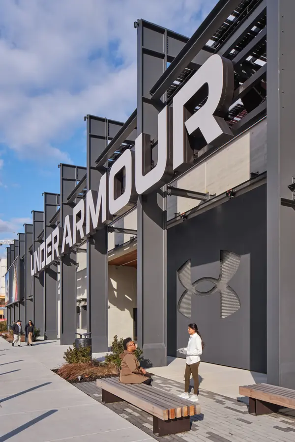 Under Armour lettering on a tall stadium facade