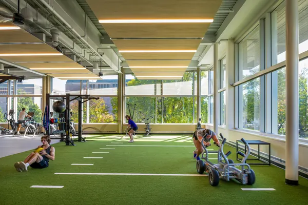 Turf training area with sleds and functional fitness equipment